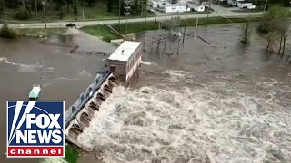 Lifethreatening flooding devastates central Michigan as dams breach [upl. by Etnoved]